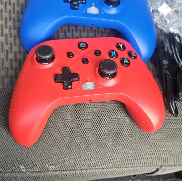 Vibrant Red and Blue Gaming Controllers - Picture 2 of 16